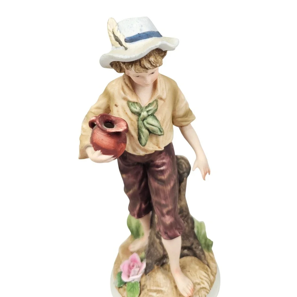 Andrea by Sadek Vintage Porcelain Boy Figurine with‎ Water Jug and Feather Hat